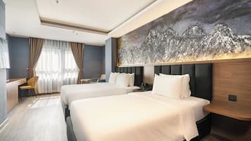 Ropa de cama hipoalergénica, colchones con efecto memoria y minibar