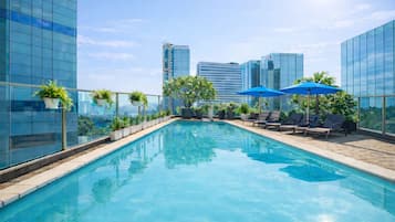 Outdoor pool, open 6:00 AM to 8:00 PM, sun loungers