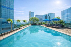 Outdoor pool, open 6:00 AM to 8:00 PM, sun loungers