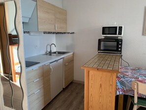 Fridge, microwave, coffee/tea maker, toaster