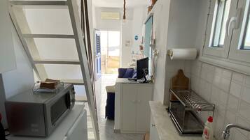 Studio Suite truyền thống | Khu phòng khách | TV màn hình phẳng