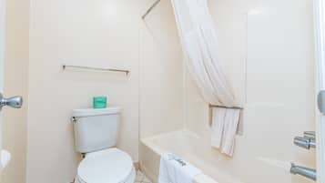 Combined shower/bathtub, towels, soap, shampoo