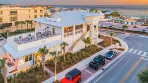 A hotel with a rooftop bar, a pool, and a view of the ocean. - Escapeto30A/GolfCartIncluded/Pool/WalkToBeach (Santa Rosa Beach)