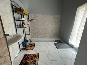 Bathtub, jetted bath, hair dryer, towels