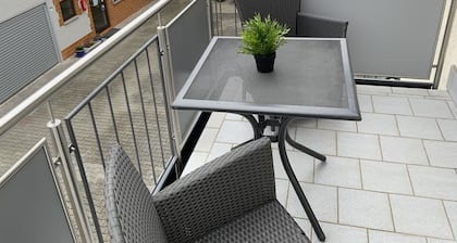 Room for fitters with shared bathroom and balcony