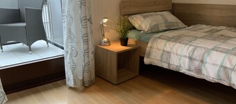 Room for fitters with shared bathroom and balcony