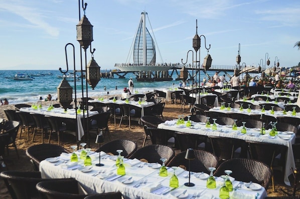 Outdoor banquet area - La Palapa beachfront fully renovated condo!  In the heart of the Romantic Zone. (Puerto Vallarta)