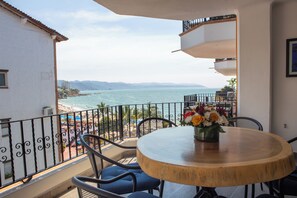 Outdoor dining - La Palapa beachfront fully renovated condo!  In the heart of the Romantic Zone. (Puerto Vallarta)