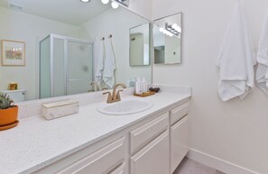 Combined shower/bathtub, hair dryer, towels, soap