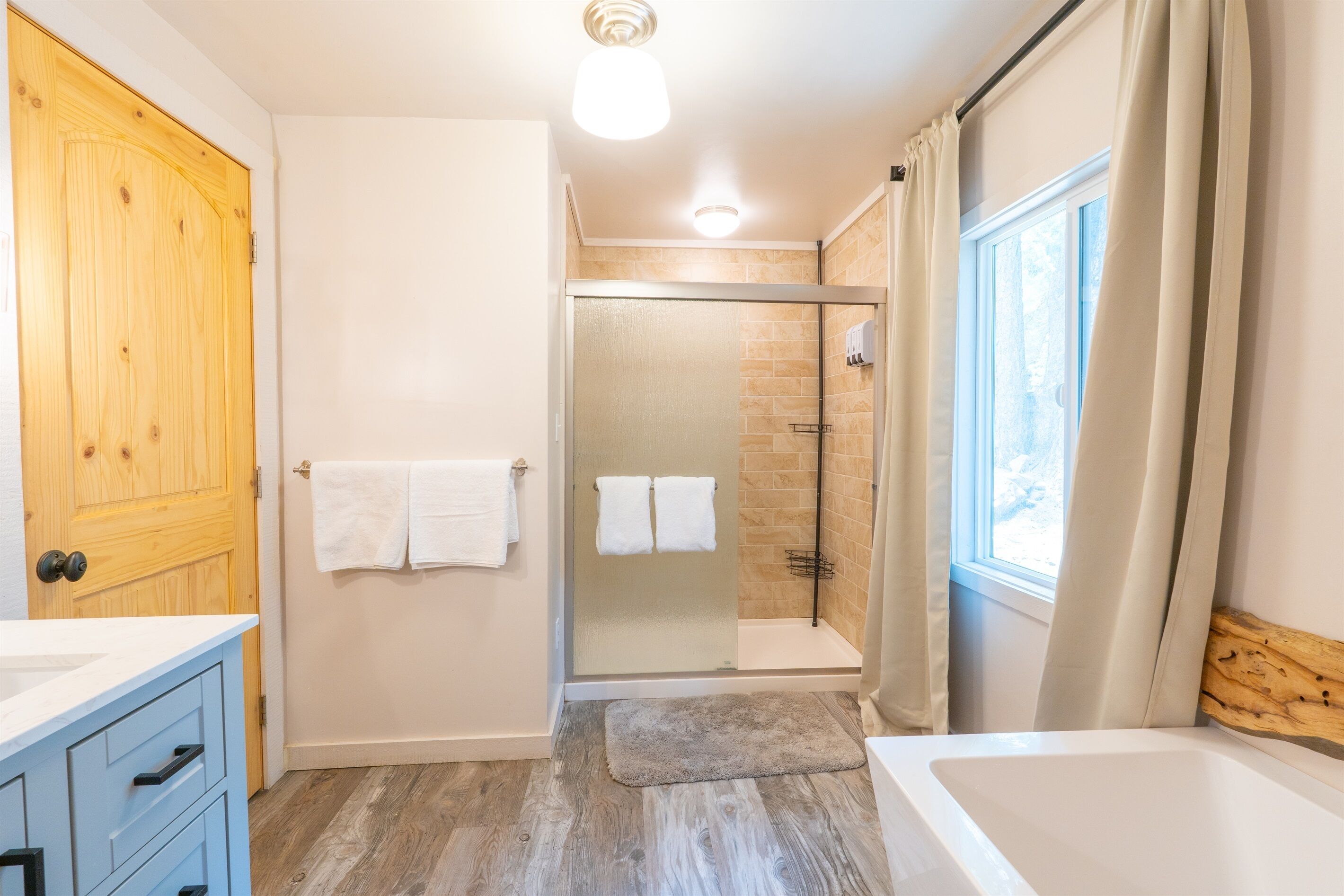 Bathtub, hair dryer, towels