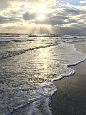 On the beach, sun loungers, beach towels