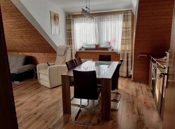 Apartment, 2 Queen Beds | Living room | 30-inch TV with digital channels, fireplace