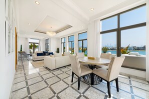 Luxury Villa, 5 Bedrooms, Beach View | Dining room - Maison Privee - Frond Villa K (Dubai)