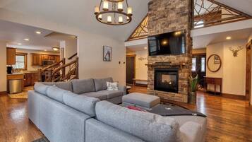 Televisión, chimenea y oficina