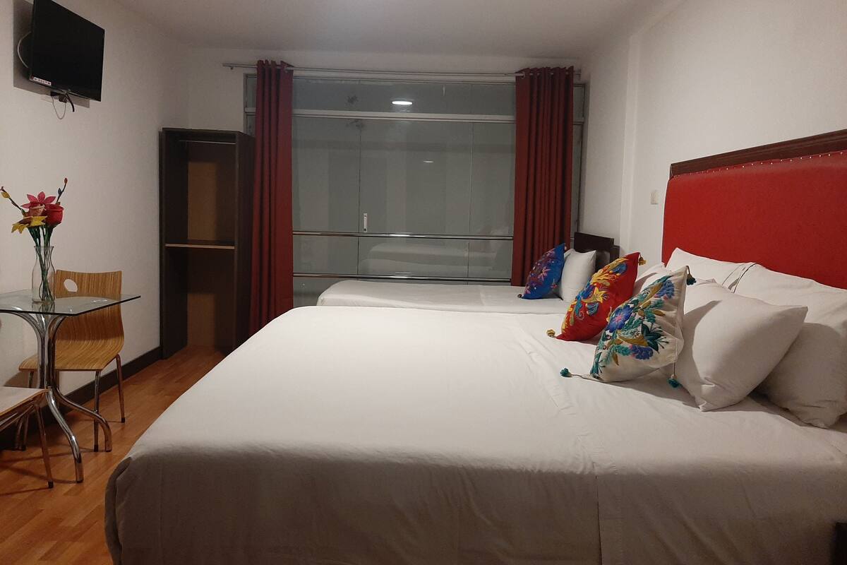 Family Room | Egyptian cotton sheets, premium bedding, down duvets, desk