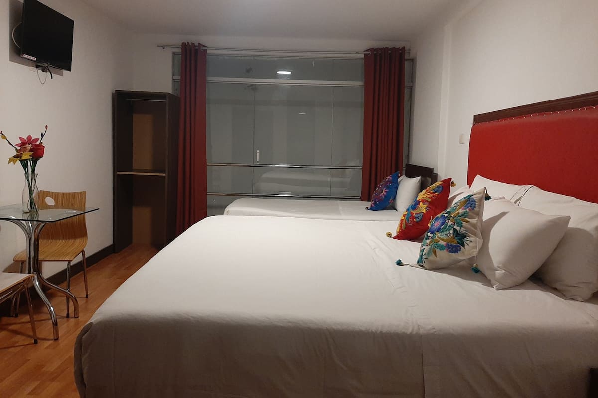 Family Room | Egyptian cotton sheets, premium bedding, down comforters, desk