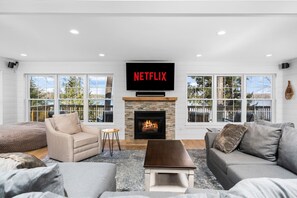 Smart TV, fireplace, books - Long Lake Retreat: Deck, Dock, BBQ, and brand-new sloped path! (Traverse City)