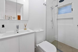 Shower, eco-friendly toiletries, hair dryer, bathrobes