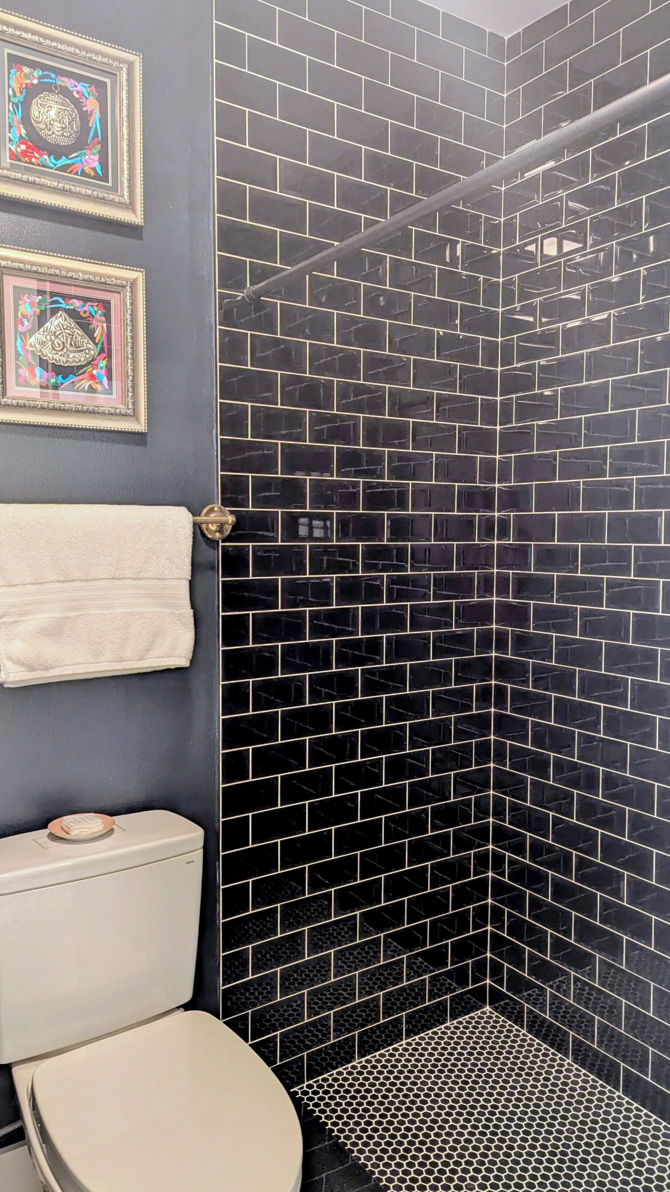 Combined shower/bathtub, hair dryer, bathrobes, towels