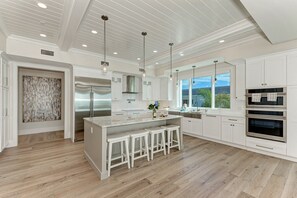 Fridge, microwave, oven, stovetop - Buena Vista #2: Luxury Beach Front Condo, Amazing Views, Pool by Anna Maria Life Vacation Rentals (Holmes Beach)