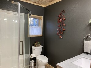 Shower, towels, soap, toilet paper