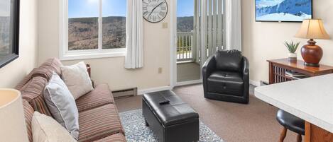 Flat-screen TV, fireplace