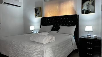 Apartment, 1 Bedroom, Patio, City View | 1 bedroom, bed sheets