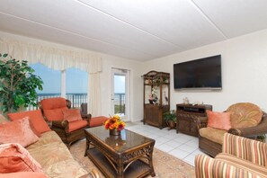 Condo, 3 Bedrooms | Living room | 36-inch flat-screen TV with digital channels, TV, DVD player - Seville 406 by Padre Island Rentals (South Padre Island)