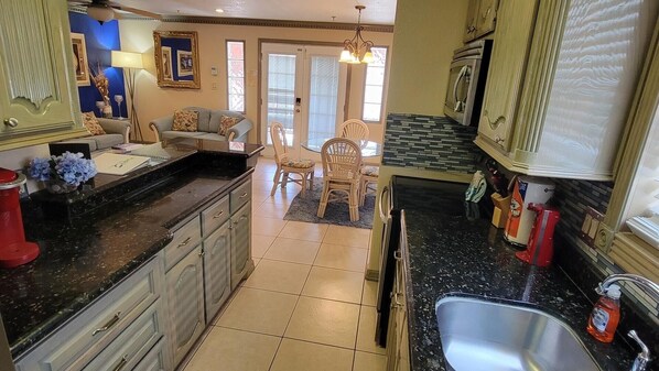 Condo, 2 Bedrooms | Private kitchen | Fridge, oven, coffee/tea maker