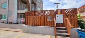 Enter a secure, gated community with a pool area and convenient access to the building.