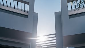 A modern building with a staircase leading to an upper level. - Tesoro Hotel Zakynthos (Zakynthos)