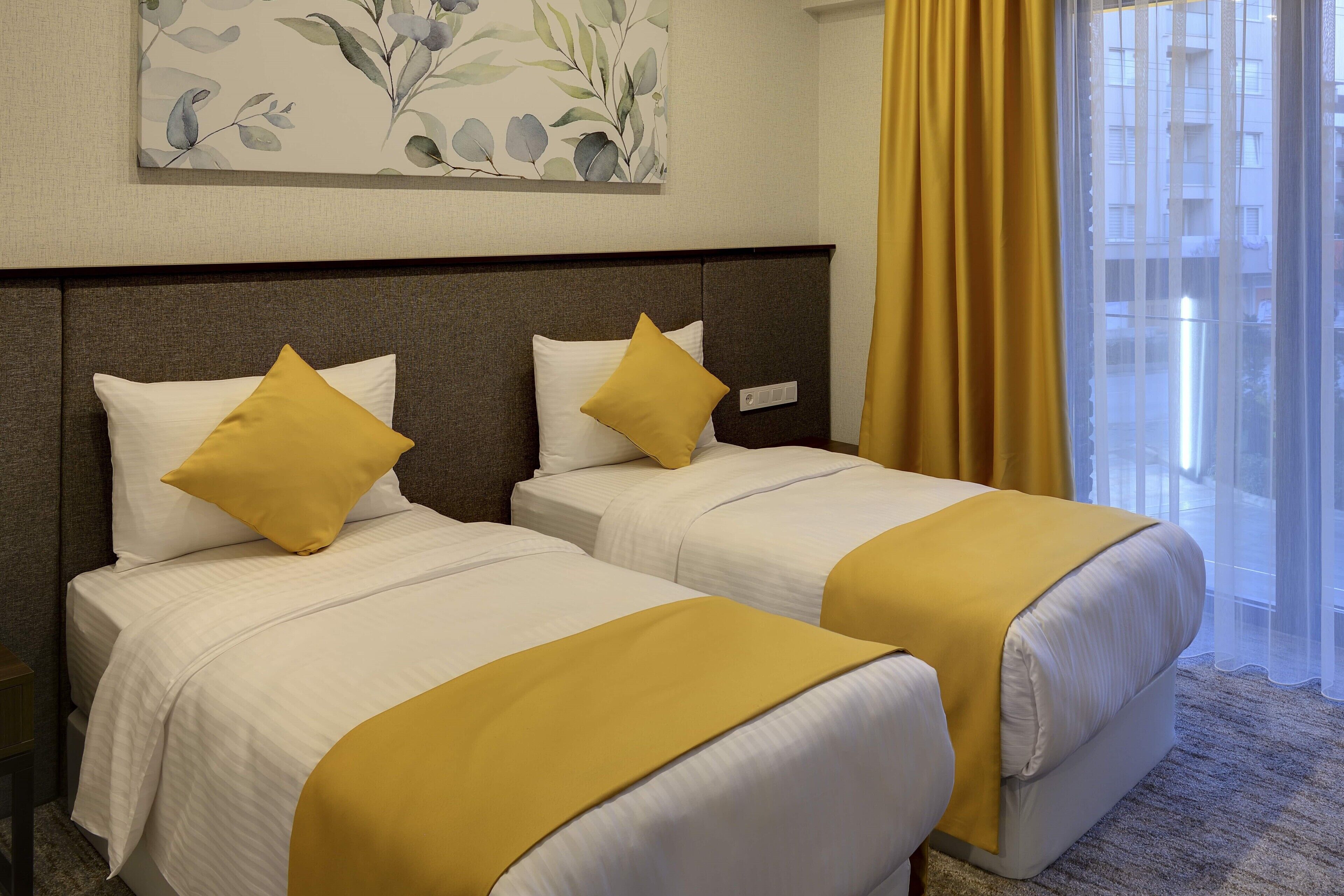 superior twin room | minibar, in-room safe, iron/ironing board, free wifi