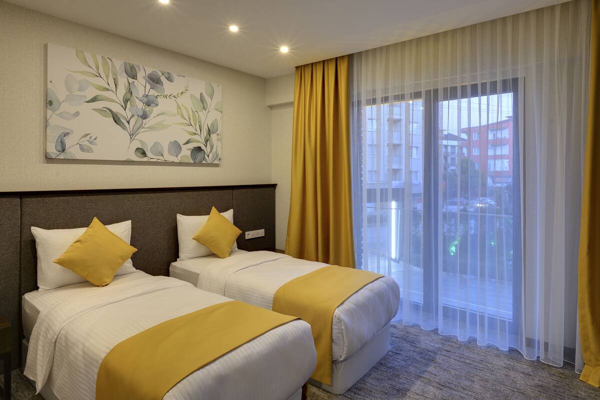 superior twin room | minibar, in-room safe, iron/ironing board, free wifi
