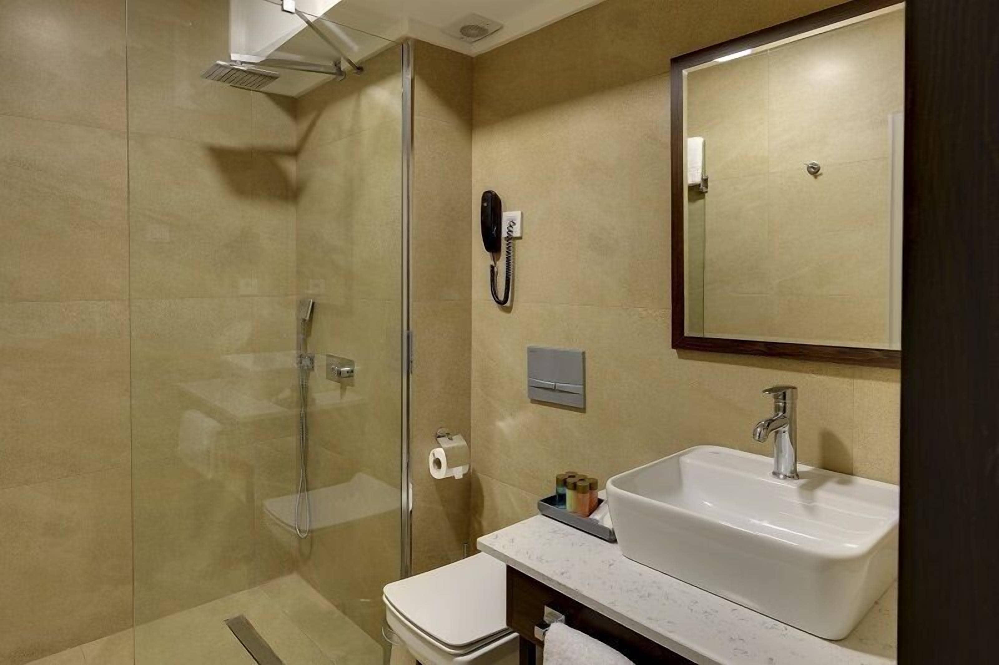 superior twin room | bathroom | shower, rainfall showerhead, hair dryer, slippers