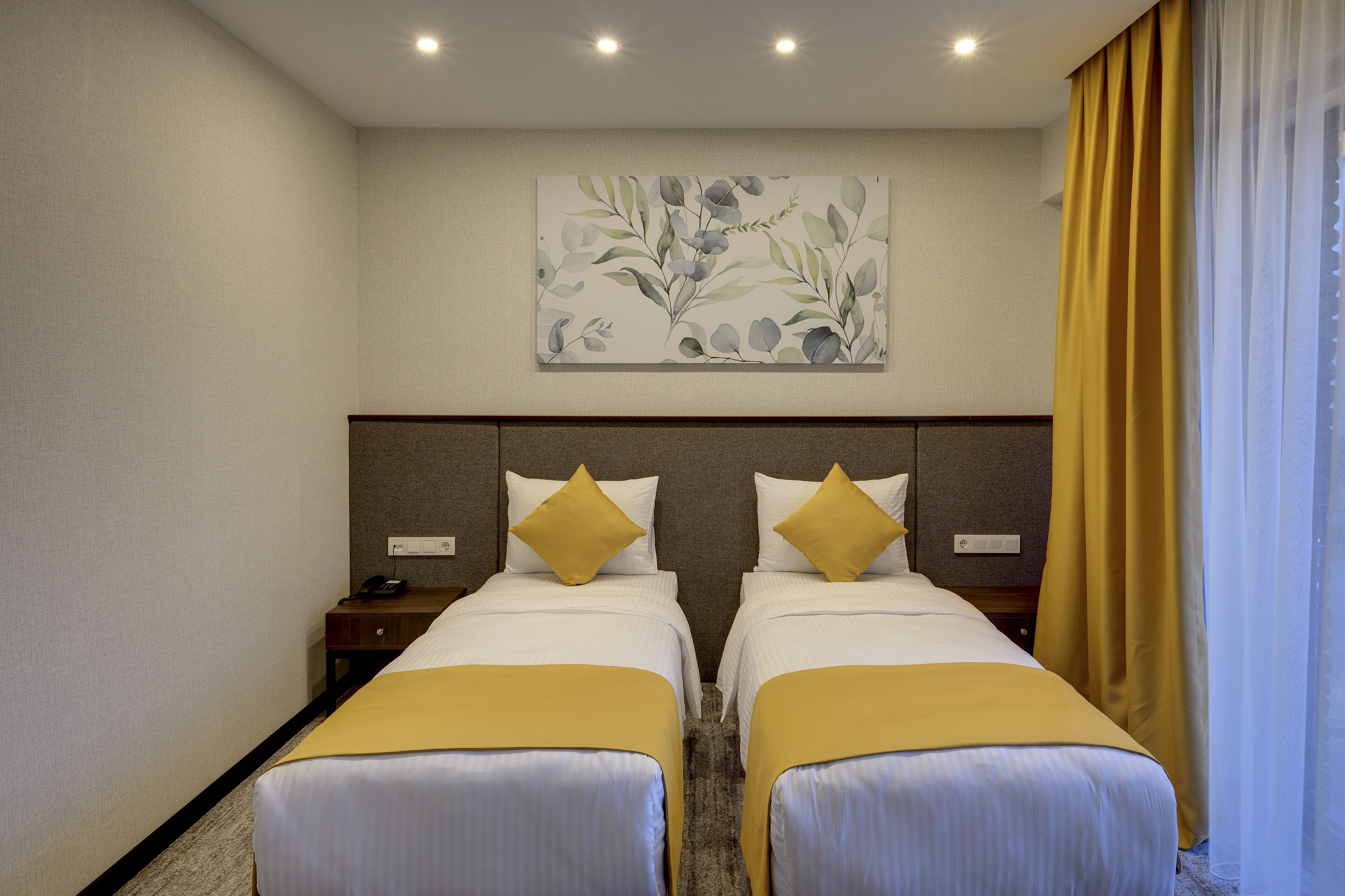 superior twin room | minibar, in-room safe, iron/ironing board, free wifi
