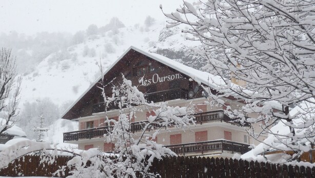 A hotel with a snow-covered roof and a visible sign reading "Les Oursons." - CENTRE Beautiful 4-room 4* chalet for 6 people, CLOSE TO EVERYTHING (Valloire)