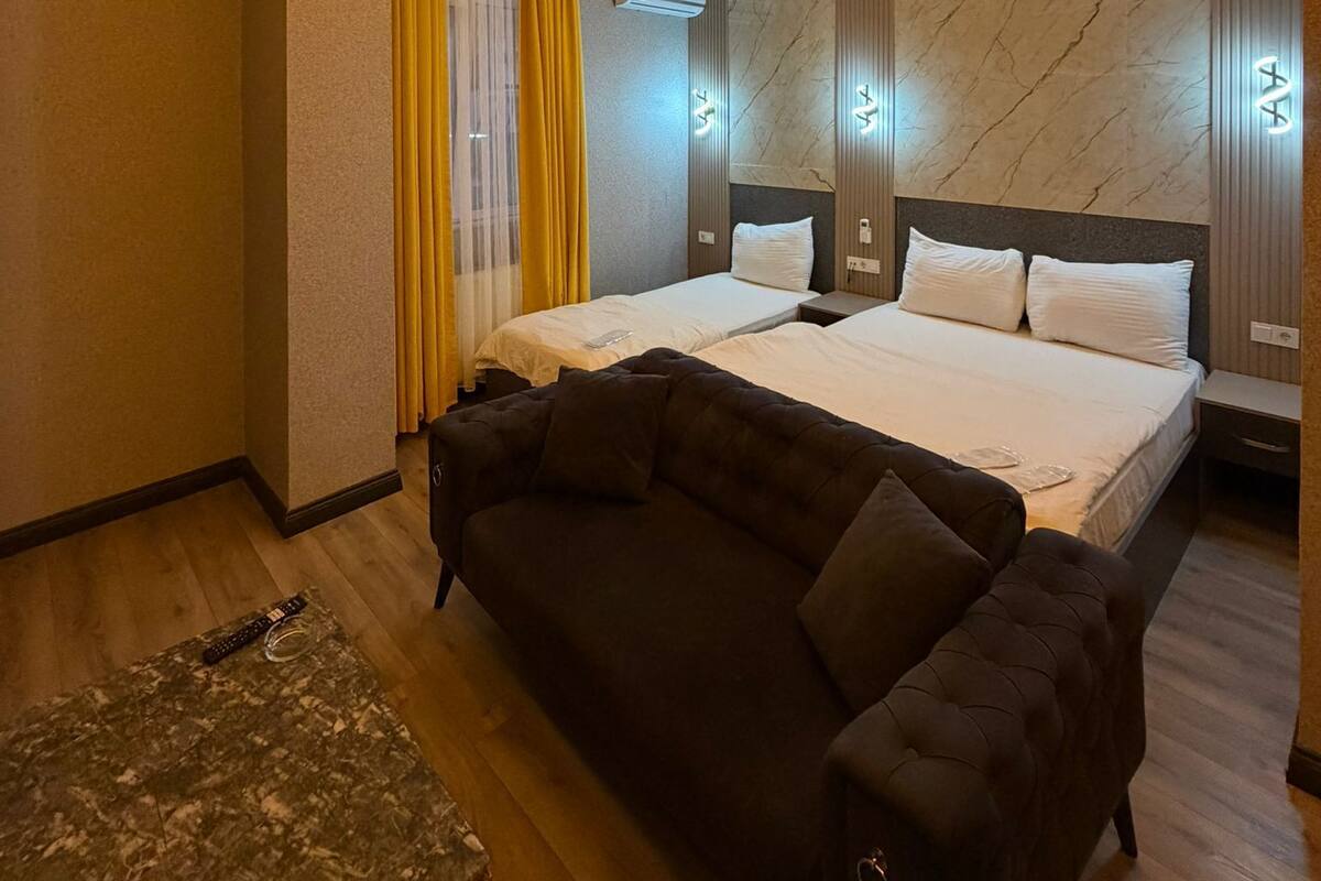 Deluxe kamer | Een strijkplank/strijkijzer, gratis wifi, beddengoed