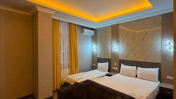 Deluxe kamer | Een strijkplank/strijkijzer, gratis wifi, beddengoed, rolstoeltoegang