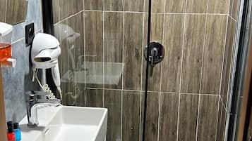 Standard Double Room | Bathroom | Shower, hair dryer, slippers, towels