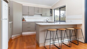 Fridge, microwave, oven, stovetop - Clarabelle Cottage light and bright open plan living overlooking beautiful bushland setting (Elizabeth Beach)