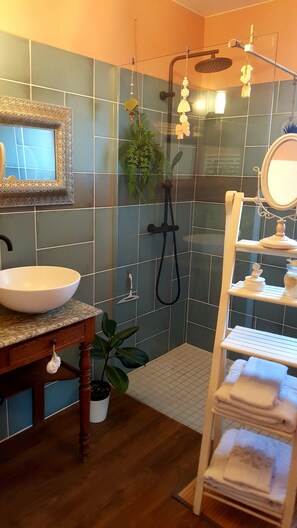 Shower, hair dryer, towels, soap