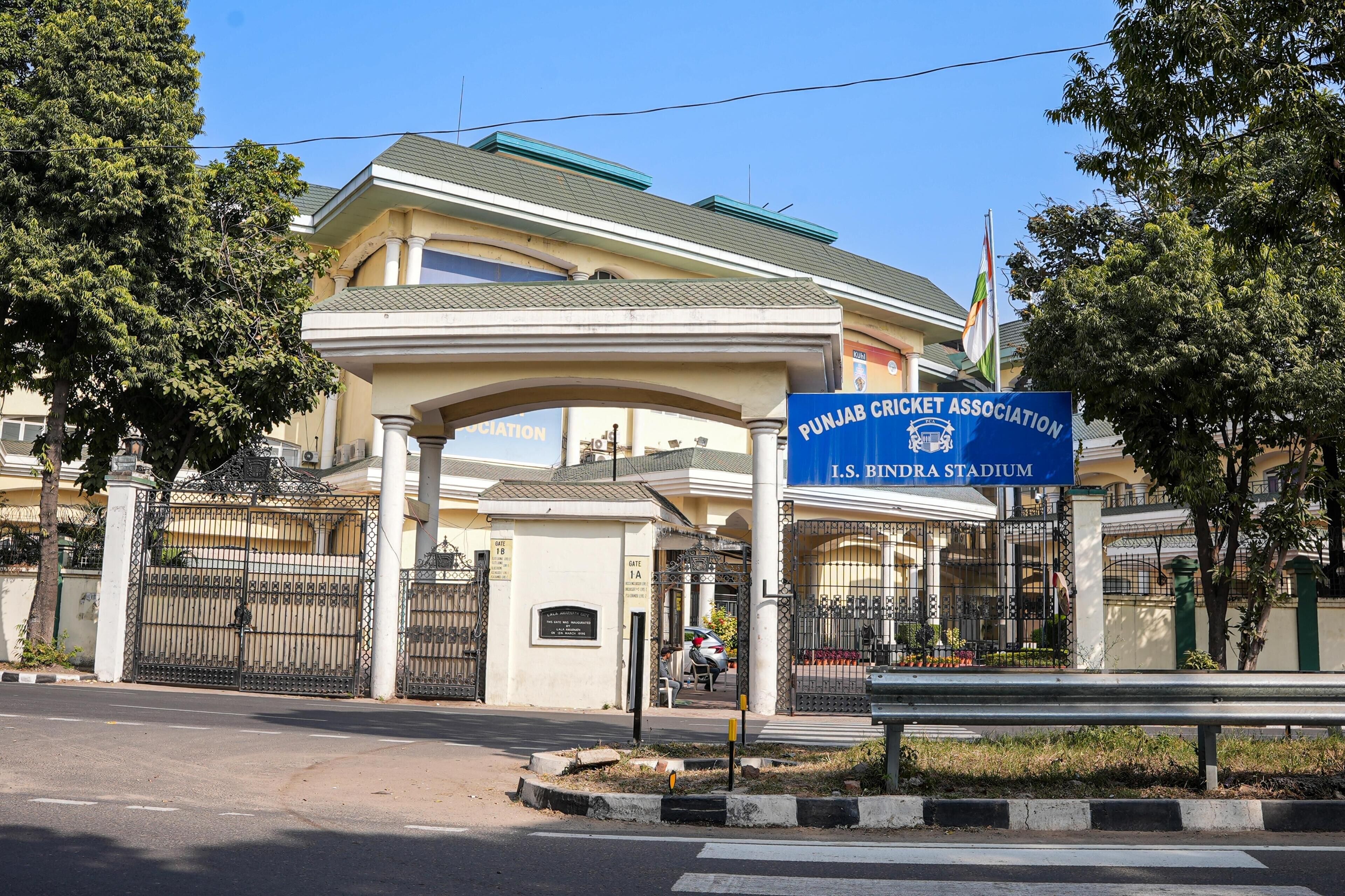 The entrance to I.S. Binda Stadium with a sign for the Punjab Cricket Association.