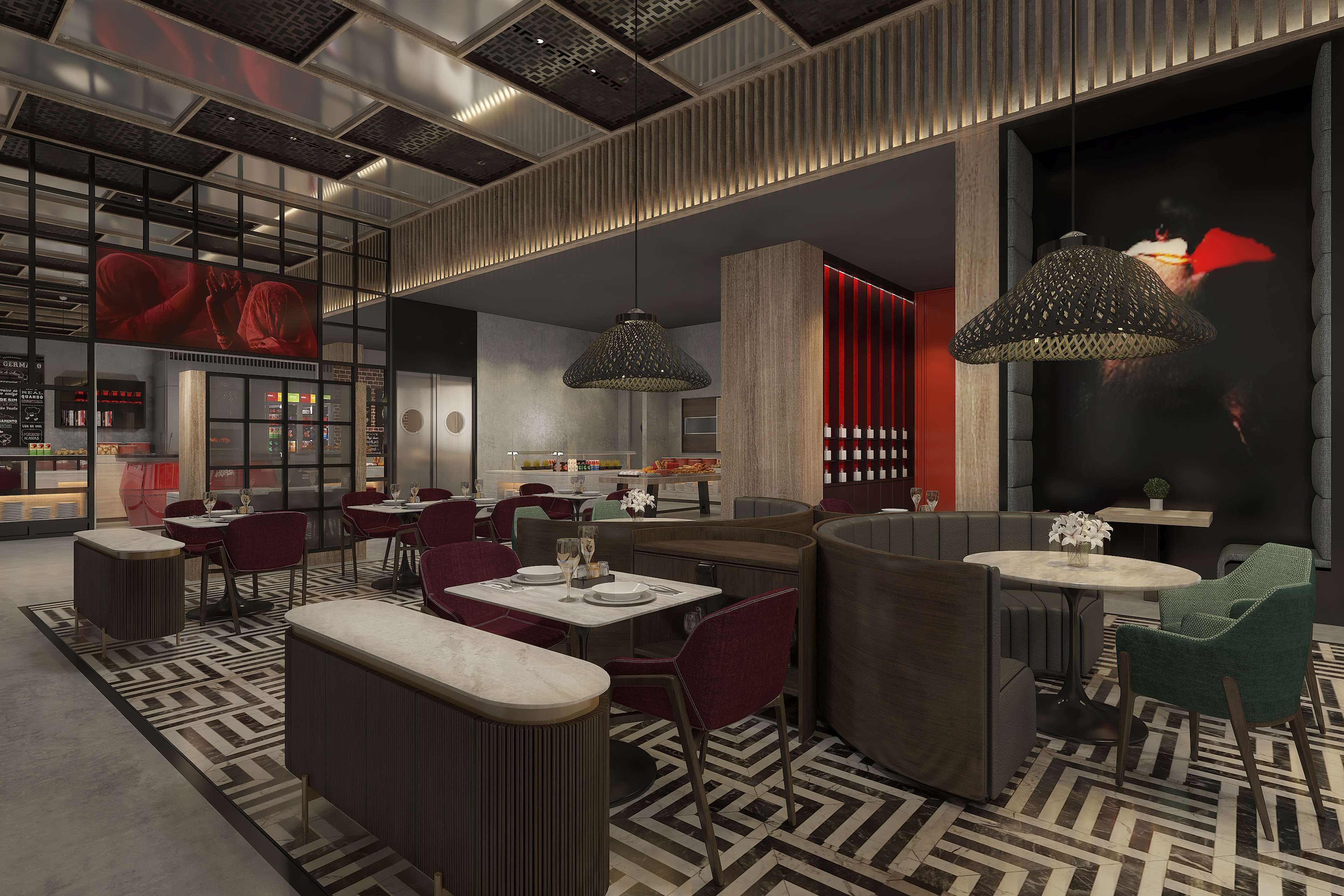 Een modern restaurant met hoge plafonds, een vloer met een patroon en eigentijds meubilair.