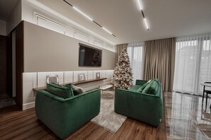 Luxury Apartment, 2 Bedrooms, City View, Executive Level | Living area | 80-inch flat-screen TV with digital channels, TV, streaming services