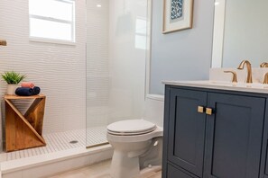 Bathtub, hair dryer, towels