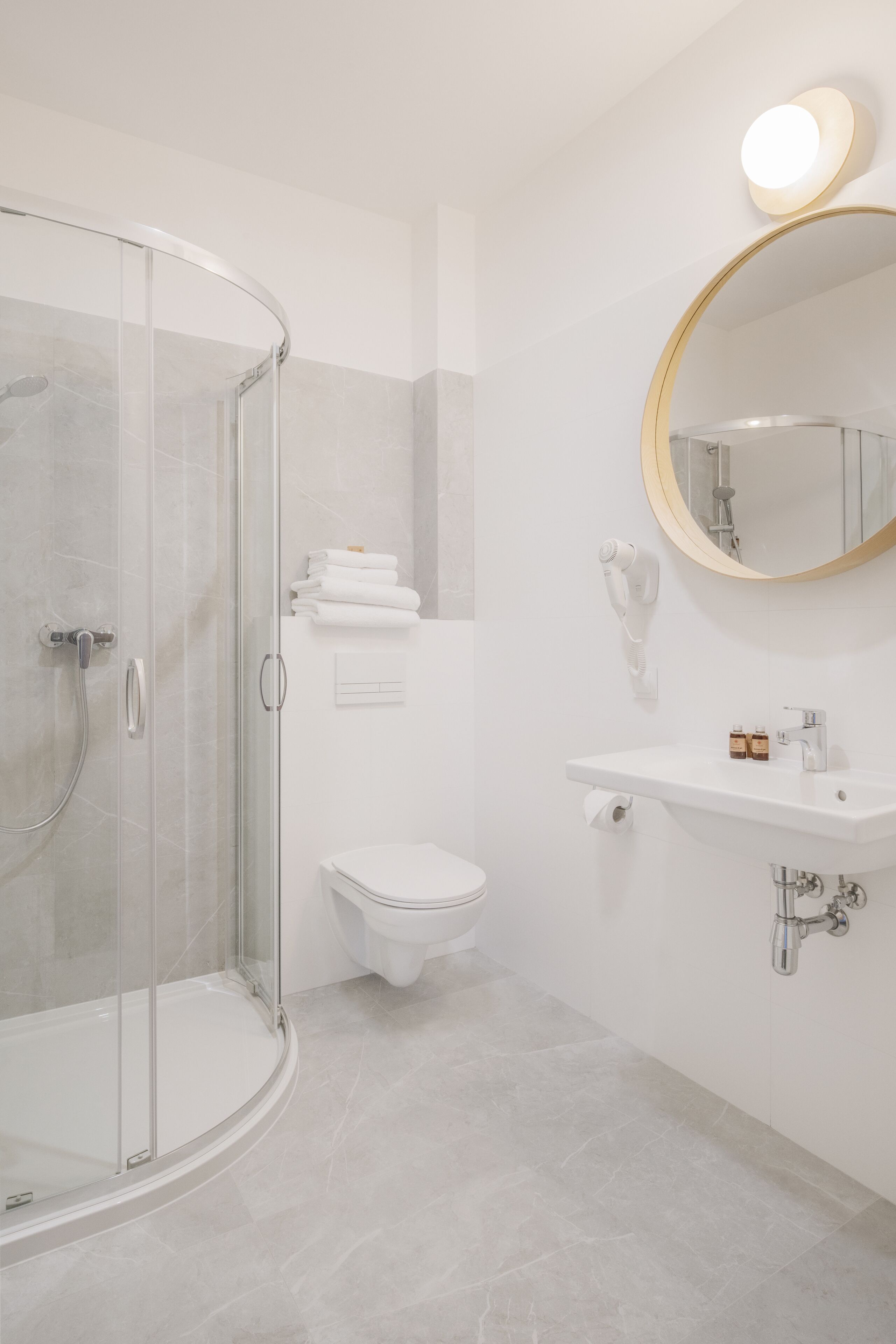 shower, free toiletries, hair dryer, towels