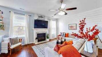 Smart TV, fireplace, foosball, books