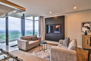 City Apartment, 2 Bedrooms, Mountain View | Living area - Reserved Suites Illovo (Sandton)
