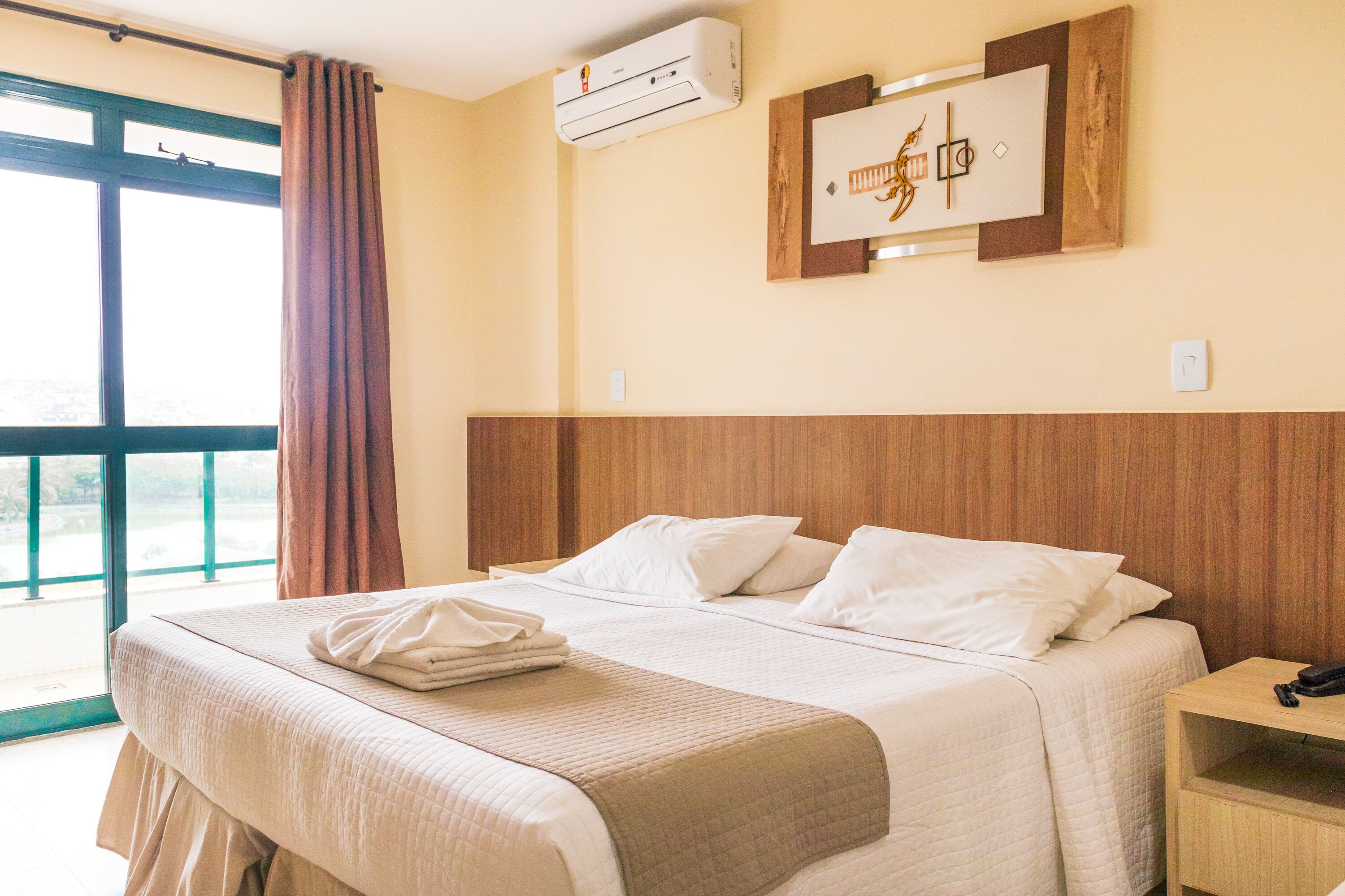 deluxe double room | in-room safe, laptop workspace, blackout curtains, iron/ironing board