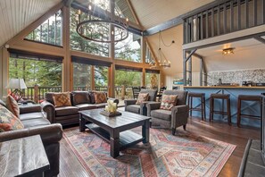 Smart TV, fireplace, books, stereo